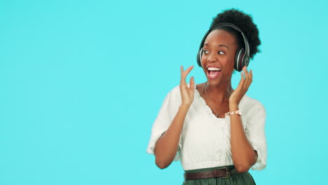 Pointing,-music-and-black-woman-with-headphones