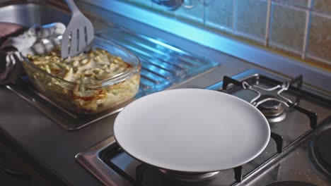 Plating-Home-Baked-Chicken-And-Pasta-Dish-With-Cheese