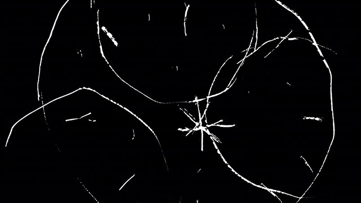 Hand-drawn animation of fireworks and sparkles scratched into 35mm film