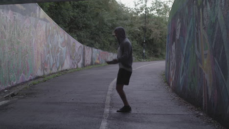 Wide-Shot-of-Athletic-Man-Jumping-Rope-in-an-Underpass---Ungraded