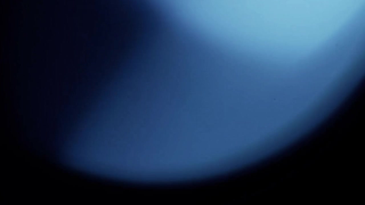 Abstract Blue Light Leaks and Lens Flares on Dark Background