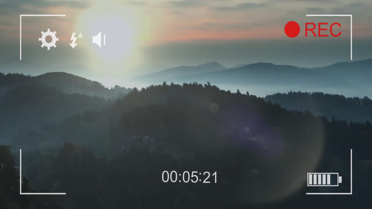 animación de la interfaz de la cámara de video digital sobre el fondo del paisaje del atardecer
