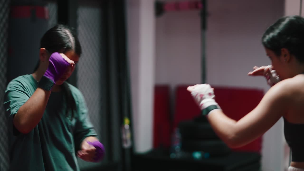 Women Boxing and Sparring in the Gym