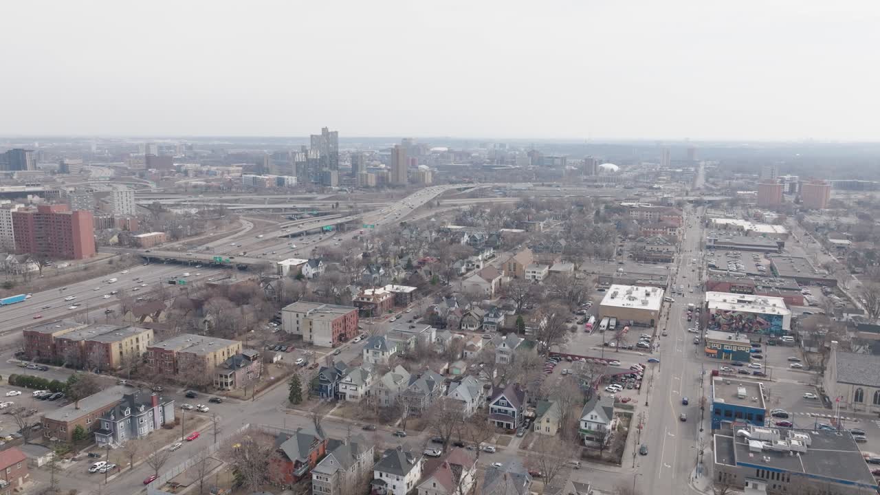 Drone view of residential homes, streets, and freeways in Minneapolis Minnesota.