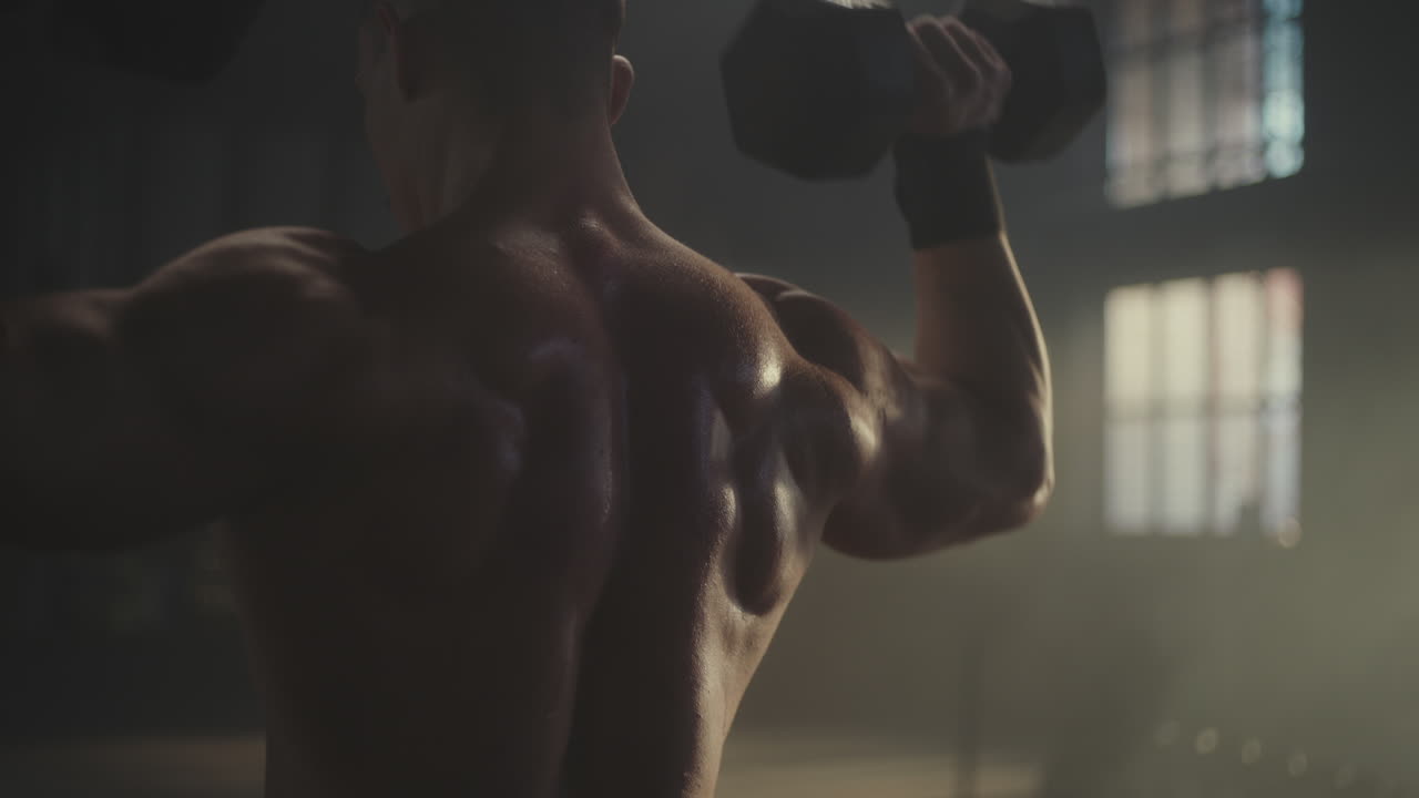 Man Doing Back Exercise in Gym