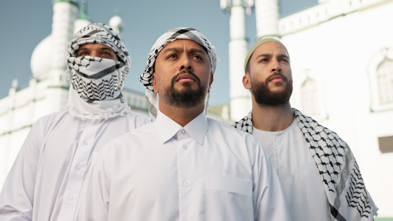 Men in traditional Middle Eastern clothing