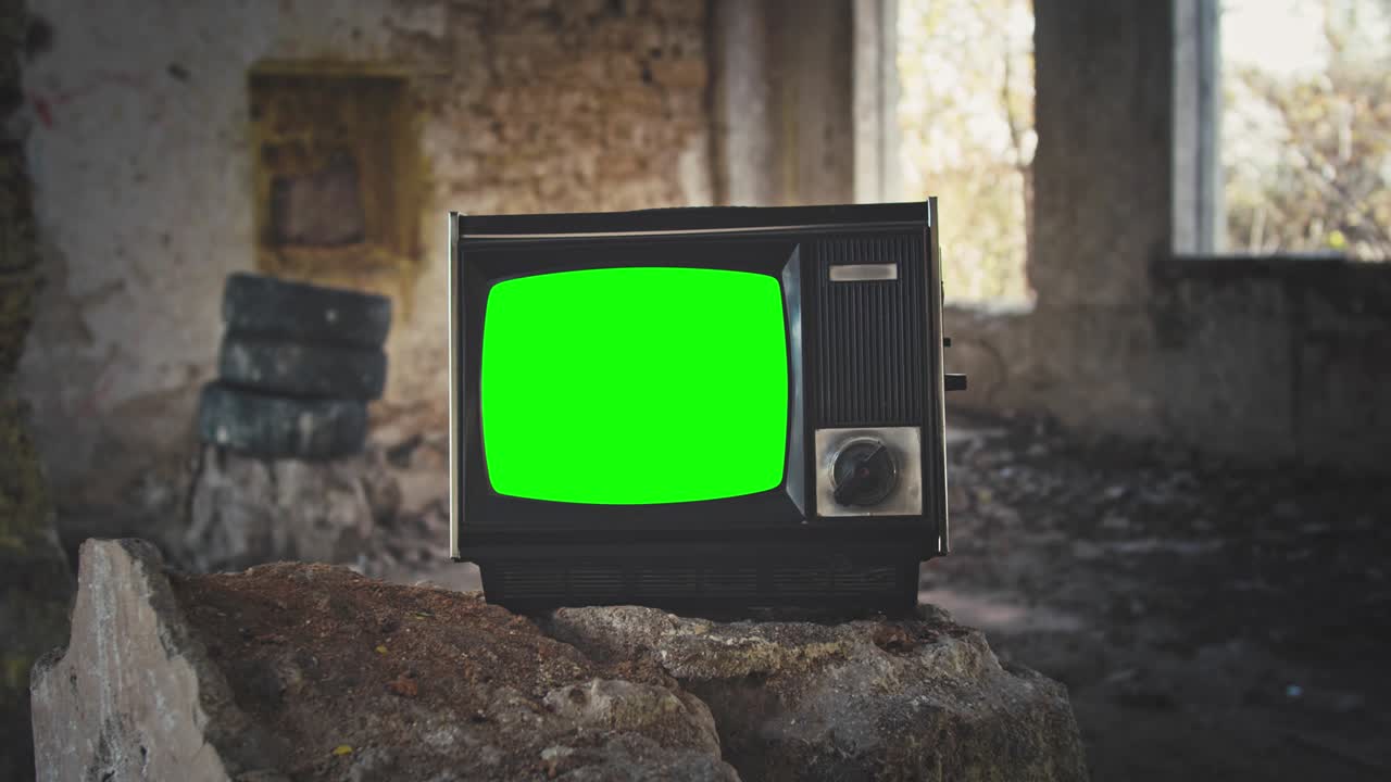 vintage television set with green screen