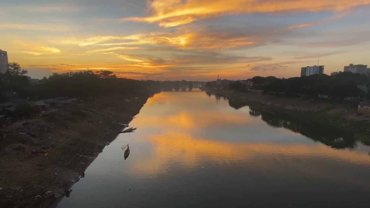 Eagle Birds are flying over the Surma river at sunset in Sylhet, Bangladesh