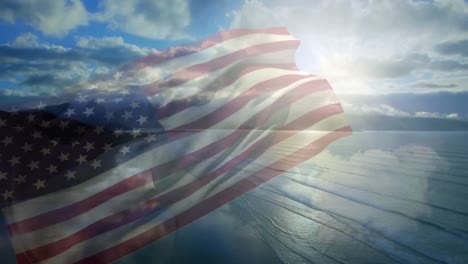 digital composition of waving us flag against aerial view of the beach and the sea