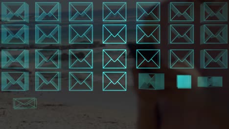 Animation of multiple neon message icons over mid section of woman using smartphone at the beach
