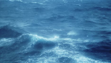 rough ocean waves causing sea sickness and making people sea sick with motion sickness, choppy dangerous waves in open water on cruise ship boat trip crossing drakes passage to antarctica