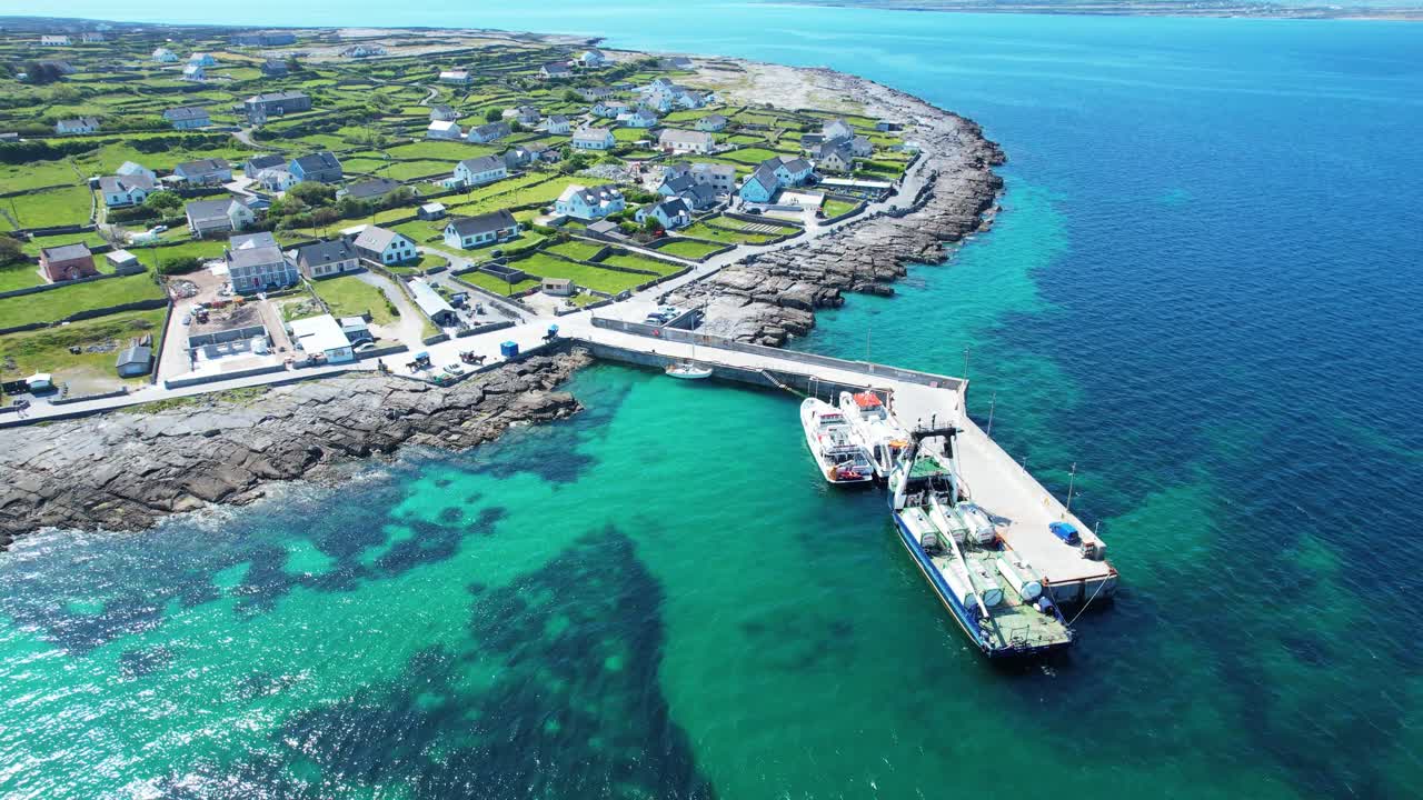 drone circling ini sheer harbour and village the beauty of the aran Islands Ireland epic location