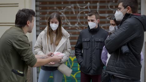 magician performing street magic show during pandemic