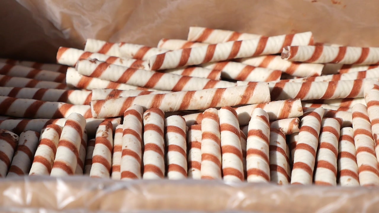 Close-up of Striped Wafer Cookie Rolls in a Box