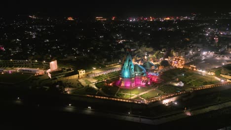 aerial view of a beautifully illuminated hindu temple at night