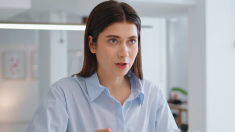 Confident manager explaining idea in office closeup. Business partners talking