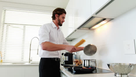 man preparing a food in kitchen