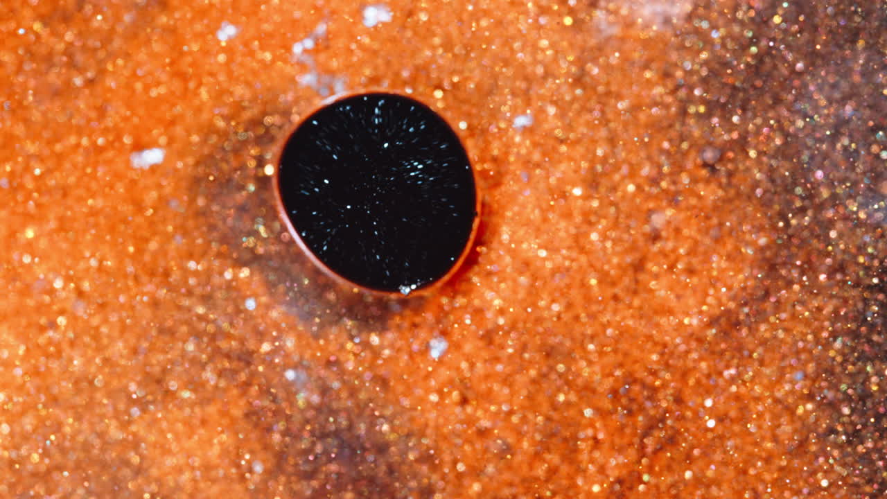 Colorful ink mixing in macro shot, texture exploration, creative mood