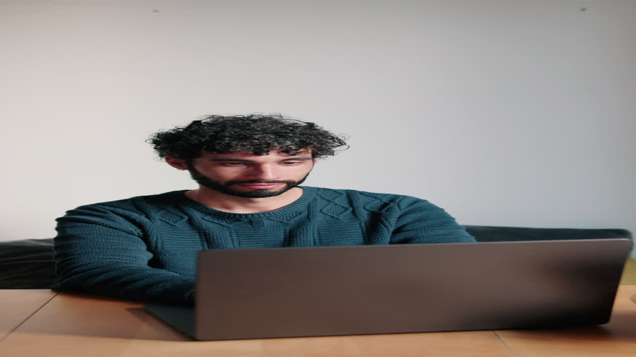 Gay or young man Working From Home on Laptop