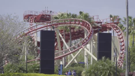 close up shot of a roller coaster twisting and turning through steel track