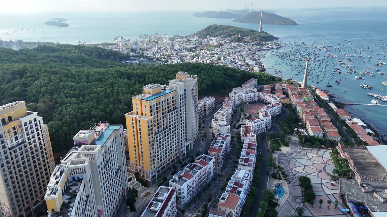 Aerial views sweep across Phu Quoc's stunning landscape boats and yachts, and the Italian-influenced architecture Located on the hillside on the southwest coast of the Pearl Island Sunset Town Vietnam