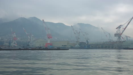 Kure-City-Seaside-and-Shipyards-in-Hiroshima-on-Rainy-Day-in-Japan