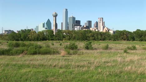 the skyscrapers rise high above the city of dallas texas