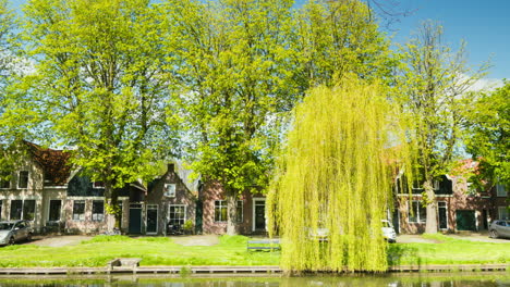 canals and historic buildings bathed in sunlight in the netherlands