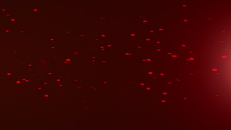 animación muy detallada de chispas rojas producidas por un emisor fuera de pantalla.
