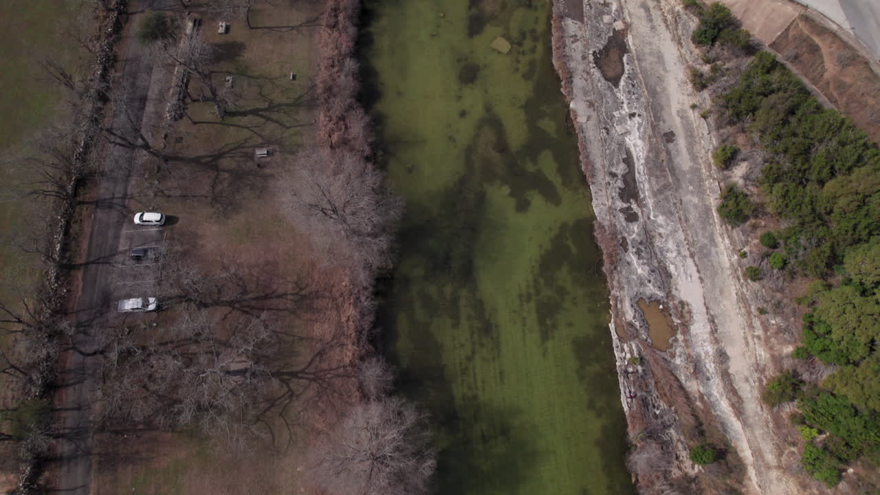 Top Down aerial view of the Blanco River and bridge near Blanco, Texas