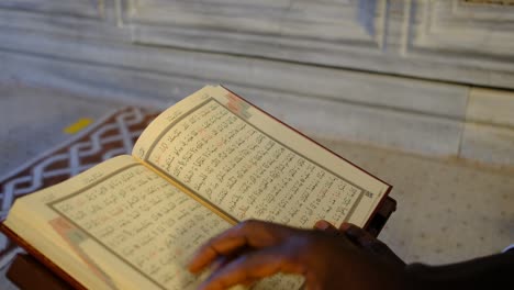 reading quran on table