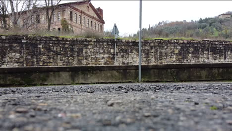 cars passing by on road in tuscany italy, seamless loop