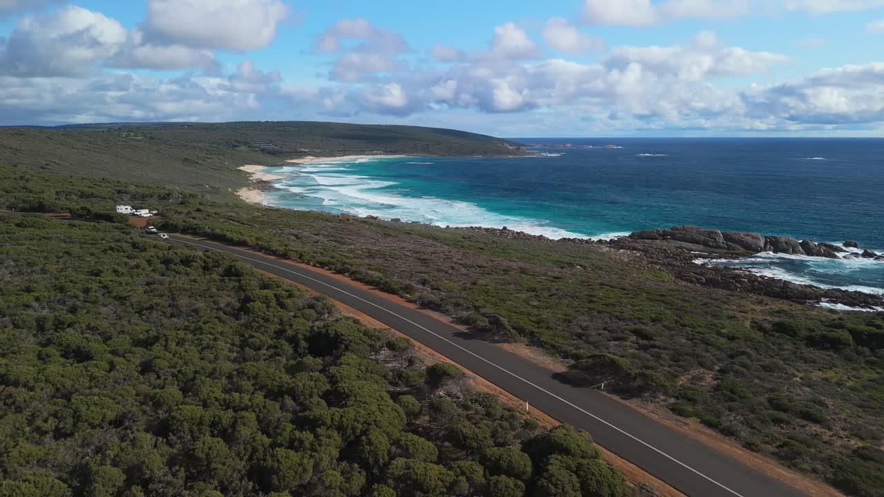Cinematic cars driving along road with beach background