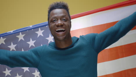 african american man with american flag