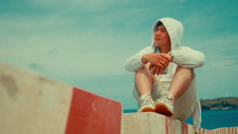 man sitting outdoors