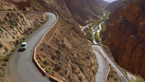 a dangerous winding road through the atlas mountains in morocco