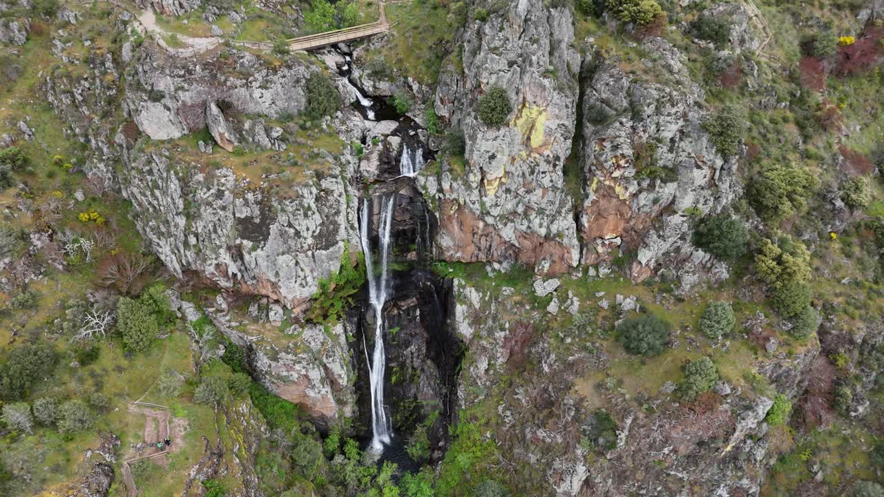 Waterfall panning fly over with drone