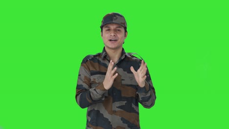 Happy-Indian-army-man-talking-to-the-camera-Green-screen