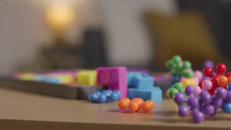 Coloured-Interlocking-Shape-Puzzles-On-Table-At-Home-For-Child-Diagnosed-With-ASD-8