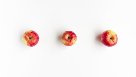 stop motion animation flat lay top view of red autumn apples