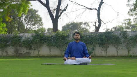 Young-Indian-man-doing-yoga-and-meditation