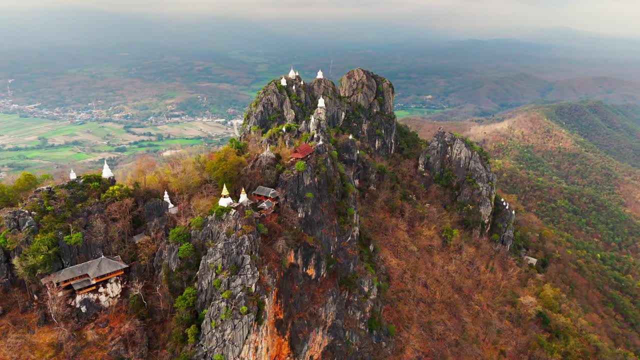 scenic aerial sky temple in Lampang Thailand mountaintop pagodas of Wat Chaloem Phra Kiat