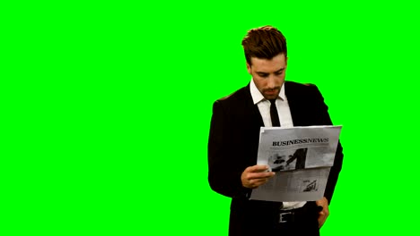 businessman reading newspaper