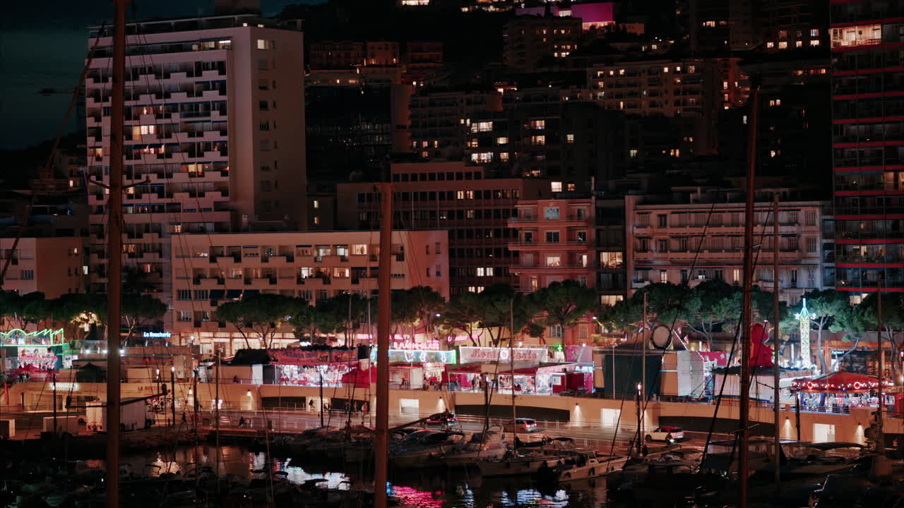 Aerial view of the Port Hercule Funfair in Monaco at night