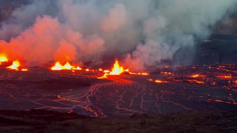 cinematic long lens panning shot across the illuminated lava lake at kilauea at sunset on the first evening of eruption in september 2023 at hawai'i volcanoes national park