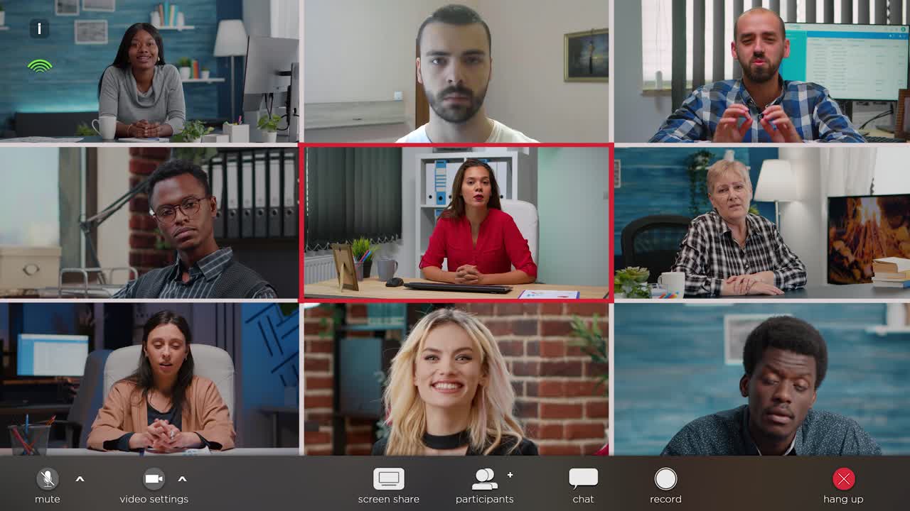 Multiethnic group of business partners attending remote videocall meeting