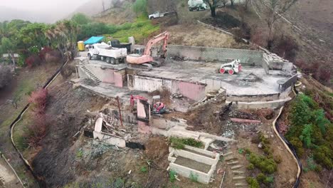 Aerial-of-a-house-being-bulldozed-on-a-hillside-in-Ventura-following-the-destruction-of-Thomas-Fire-3