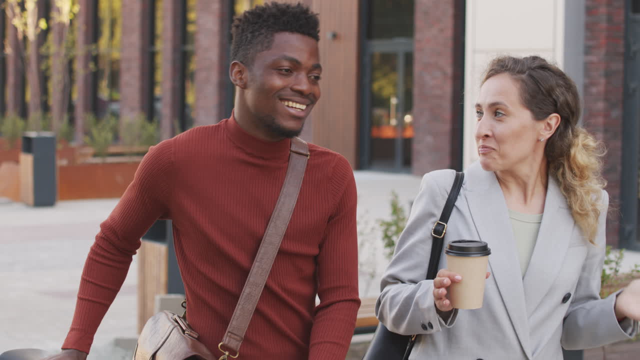 Business Couple Walking Outdoors