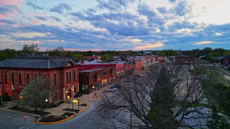 drone shot of downtown sandwich, il, filmed at sunset