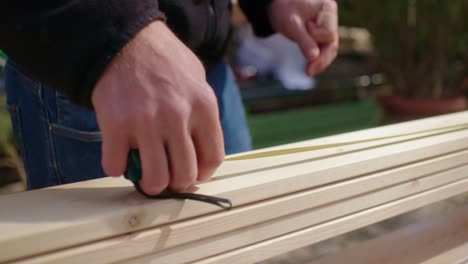 the stacked wood planks are decently measured and marked